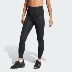 Legginsy Optime Stash 7/8. Czarne legginsy adidas, bez wzorów, sportowe. Za 259.00 zł.