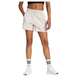 Damskie szorty tkane adidas Essentials 3-Stripes. Brązowe szorty sportowe adidas, bez wzorów, z materiału, na fitness i siłownię. Za 151.30 zł.