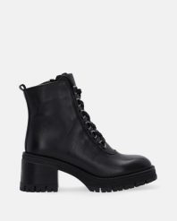 CZARNE BOTKI NA OBCASIE 1111013 101 BLAC. Czarne botki Venezia, bez wzorów, ze skóry, bez obcasa, na obcasie, bez zapięcia. Za 399.00 zł.
