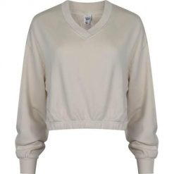 Bluza sportowa damska Reebok HS4737. Białe bluzy bez kaptura Reebok, s, bez wzorów, z bawełny, bez kaptura. Za 172.00 zł.