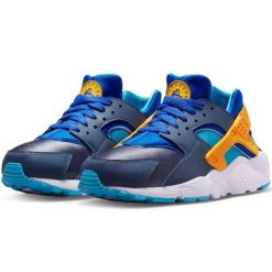 Buty Nike Air Huarache Run 654275 422 niebieskie. Niebieskie buty treningowe bez wzorów, z materiału, bez zapięcia. Za 491.47 zł.