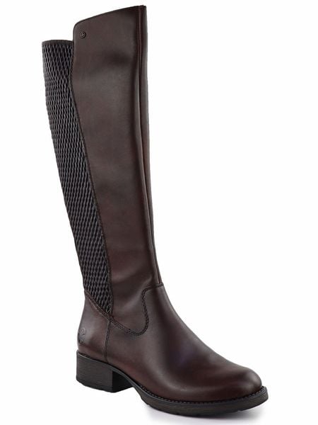 Skórzane brązowe kozaki z elastyczną gumą ocieplane Rieker Z9591-27. Brązowe kozaki Rieker, bez wzorów, z gumy, bez obcasa, bez zapięcia. Za 529.00 zł.