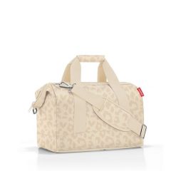 Torba ALLROUNDER M, leo vanilla. Białe torby sportowe Reisenthel, bez wzorów, z materiału, na ramię. Za 185.90 zł.