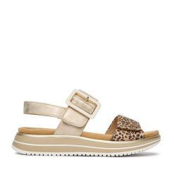 Sandały Remonte. Żółte sandały Remonte, bez wzorów, bez obcasa, na płaskiej podeszwie, bez zapięcia. Za 379.99 zł.