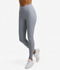 Legginsy sportowe damskie. Niebieskie legginsy NORDICDOTS, bez wzorów, z materiału, sportowe. Za 365.00 zł.