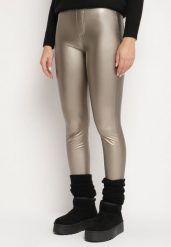 Złote Legginsy z Ekoskóry z Wysokim Stanem i Wsuwanymi Kieszeniami Rievalia. Żółte legginsy Born2be, bez wzorów, z jeansu. Za 29.99 zł.