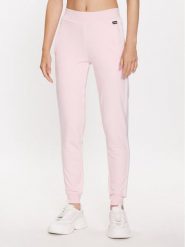 Guess Spodnie dresowe Rosas V3YB20 KBV71 Różowy Regular Fit. Czerwone spodnie dresowe Guess, z aplikacjami, z bawełny. Za 209.99 zł.