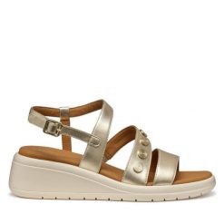 Sandały Geox. Żółte sandały Geox, bez wzorów, bez obcasa, na koturnie, bez zapięcia. Za 469.99 zł.