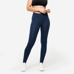 Legginsy fitness damskie Domyos slim. Niebieskie legginsy DOMYOS, bez wzorów, z bawełny, eleganckie. Za 49.99 zł.