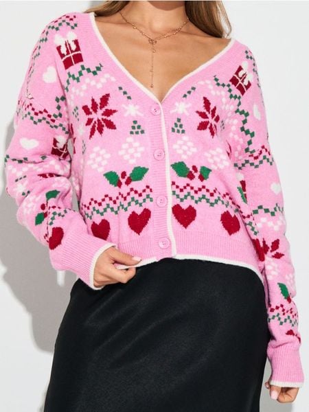 Świąteczny kardigan z motywem gwiazdy betlejemskiej i serduszek - wielobarwny. Swetry Sinsay, l, bez wzorów, wizytowe, bez ramiączek. Za 69.99 zł.