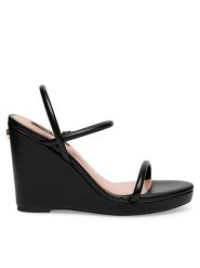 Nine West Sandały WFA2624-1 Czarny. Czarne sandały Nine West, bez wzorów, z syntetyku, bez obcasa, na koturnie, bez zapięcia. Za 219.99 zł.