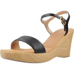 Sandały UNISA RITA NTO Czarny. Czarne sandały Unisa, bez wzorów, ze skóry, sportowe, bez obcasa, bez zapięcia. Za 354.99 zł.