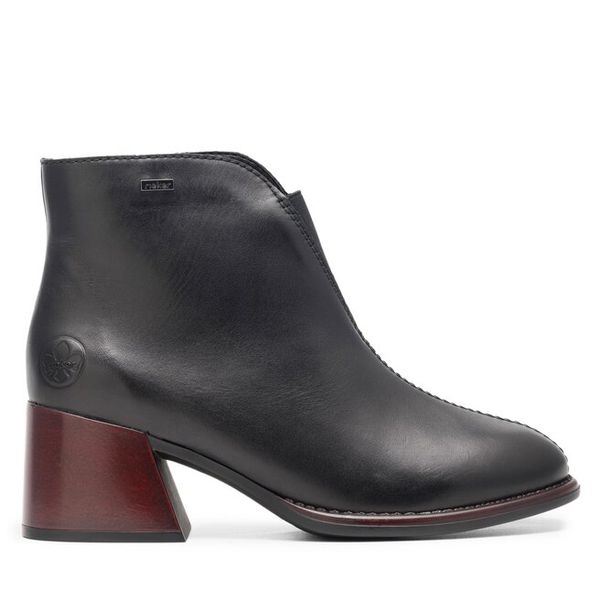 Botki Rieker. Czarne botki Rieker, bez wzorów, bez obcasa, na płaskiej podeszwie, bez zapięcia. Za 369.99 zł.