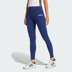 Legginsy Essentials Linear Cotton. Białe legginsy adidas, bez wzorów, sportowe. Za 119.00 zł.