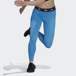Legginsy damskie adidas TECHFIT 7/8. Niebieskie legginsy adidas, bez wzorów, z materiału, sportowe. Za 162.99 zł.