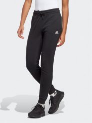 Adidas Spodnie dresowe Essentials Linear French Terry Cuffed Joggers IC6868 Czarny Slim Fit. Czarne spodnie dresowe adidas, bez wzorów, z bawełny. Za 129.99 zł.
