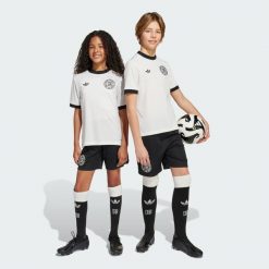 Szorty Germany Anniversary Kids. Białe szorty adidas, bez wzorów, z materiału, sportowe. Za 179.00 zł.
