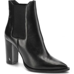 Czarne Botki Carinii Eleganckie Skórzane Buty Na Obcasie. Czarne botki Carinii, bez wzorów, eleganckie, bez obcasa, na obcasie, bez zapięcia. Za 519.00 zł.