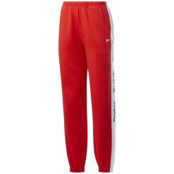 Spodnie dresowe damskie Reebok Te Linear Logo Fl P. Czerwone spodnie dresowe Reebok, bez wzorów, z dresówki, długie. Za 147.20 zł.