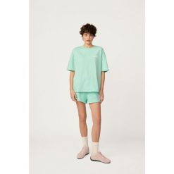 T-shirt Kubota miętowy damski. Zielone t-shirty sportowe Kubota, m, bez wzorów, z materiału, bez ramiączek. W wyprzedaży za 59.99 zł.
