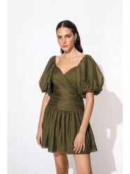 By Malina Sukienka "Nola" w kolorze khaki rozmiar: L. Brązowe sukienki BY MALINA, l, bez wzorów, bez kołnierzyka, bez ramiączek, mini, rozkloszowane. Za 358.29 zł.