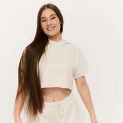 Bluza damska fitness z kapturem krótka Relay Cropped Pearl. Białe bluzy GYMBEAM, xl, bez wzorów, z bawełny, klasyczne, bez ramiączek, z kapturem. Za 125.90 zł.