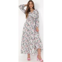 Jasnoniebieska Sukienka Partharpia. Niebieskie sukienki Born2be, l, z aplikacjami, z materiału, bez kołnierzyka, bez ramiączek, maxi, kopertowe. Za 179.99 zł.