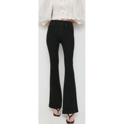 Spanx spodnie damskie high waist. Czarne spodnie materiałowe Spanx, bez wzorów, z materiału, z podwyższonym stanem. W wyprzedaży za 419.99 zł.