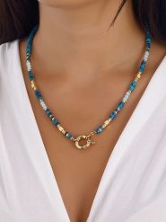 Luja Bijoux Pozłacany naszyjnik z turkusem i elementem ozdobnym - 42 cm rozmiar: onesize. Żółte naszyjniki Luja Bijoux, z materiału, z turkusem, metalowe. Za 85.95 zł.