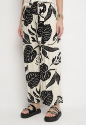 Jasnobeżowe Spodnie w Kwiaty o Szerokim Kroju z Gumką i Paskiem Eledina. Brązowe jeansy Born2be, m, bez wzorów, z jeansu, eleganckie. W wyprzedaży za 55.99 zł.
