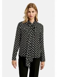 Milano Italy Bluzka w kolorze czarnym rozmiar: 38. Czarne bluzki Milano Italy, bez wzorów, z wiskozy, bez kołnierzyka, bez ramiączek. Za 173.99 zł.