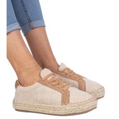 Brązowe damskie espadryle sznurowane. Brązowe espadryle bez wzorów, ze skóry, z okrągłym noskiem, bez obcasa, na platformie. Za 81.83 zł.