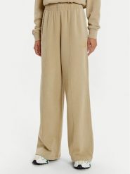 Lacoste Spodnie dresowe XF2657 Beżowy Wide Leg. Brązowe spodnie dresowe Lacoste, bez wzorów, z bawełny. Za 379.99 zł.