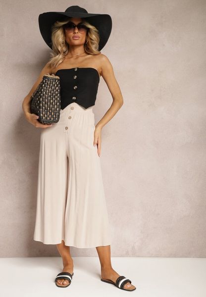 Beżowe Wiskozowe Spodnie Palazzo z Gumką w Talli Zdobione Guzikami z Nogawkami 3/4 Efinna. Brązowe jeansy Renee, na lato, l, z aplikacjami, z jeansu, biznesowe. Za 59.99 zł.