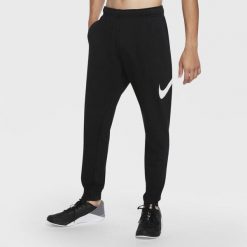 Spodnie treningowe damskie Nike Taper. Czarne spodnie dresowe Nike, bez wzorów. Za 476.00 zł.