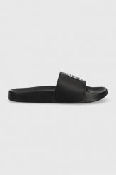 Puma klapki skórzane x VOGUE damskie kolor czarny. Czarne klapki Puma, z aplikacjami, bez obcasa, na płaskiej podeszwie, bez zapięcia. Za 229.99 zł.