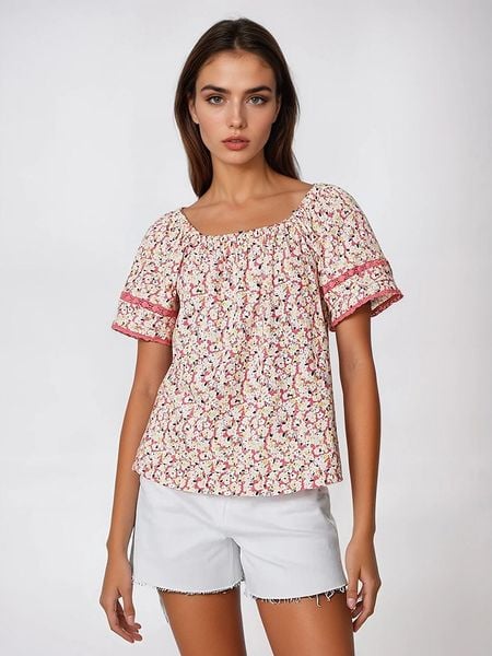 Marks & Spencer Bluzka w kolorze różowo-kremowym rozmiar: 40. Brązowe bluzki Marks & Spencer, bez wzorów, z bawełny, bez kołnierzyka, bez ramiączek. Za 43.78 zł.