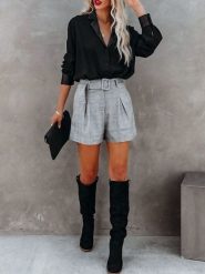 Milan Kiss Bluzka w kolorze czarnym rozmiar: L. Czarne bluzki Milan Kiss, l, bez wzorów, bez kołnierzyka, bez ramiączek. Za 152.99 zł.