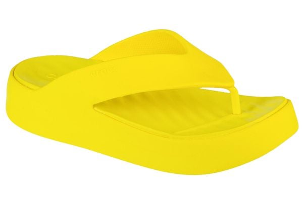 Japonki damskie Crocs C4618. Żółte japonki Crocs, bez wzorów, z materiału. Za 139.99 zł.