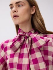 Koszula z ozdobnym wiązaniem - wielobarwny. Koszule Reserved, l, bez wzorów, z bawełny, bez kołnierzyka, bez ramiączek. W wyprzedaży za 119.99 zł.