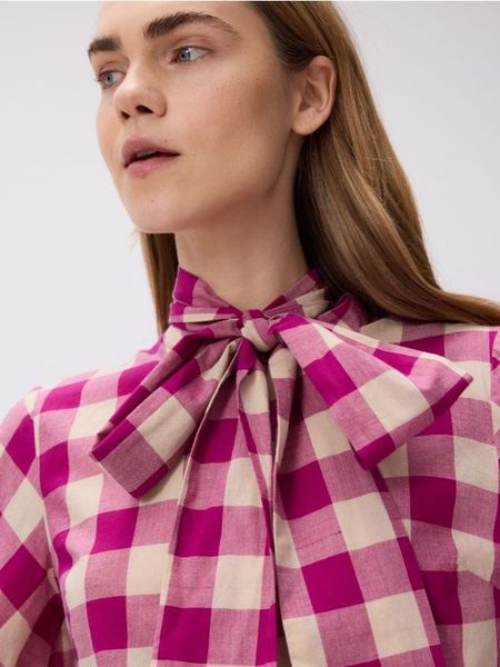 Koszula z ozdobnym wiązaniem - wielobarwny. Koszule Reserved, l, bez wzorów, z bawełny, bez kołnierzyka, bez ramiączek. W wyprzedaży za 119.99 zł.