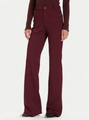 Guess Spodnie materiałowe W5BB16 KCMU2 Czerwony Flare Fit. Czerwone spodnie materiałowe Guess, z aplikacjami, z materiału. Za 529.99 zł.