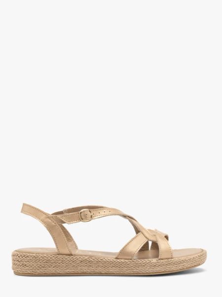 Złote sandały damskie płaskie. Żółte sandały Ryłko, bez wzorów, ze skóry, wakacyjne, bez obcasa, na płaskiej podeszwie, bez zapięcia. W wyprzedaży za 199.99 zł.