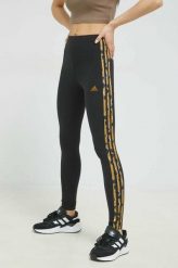 Adidas legginsy damskie kolor czarny z aplikacją. Czarne legginsy adidas, z aplikacjami, z bawełny. Za 179.99 zł.