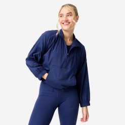 Bluza sportowa damska Domyos. Niebieskie bluzy z kapturem DOMYOS, m, bez wzorów, z materiału, bez kaptura, na fitness i siłownię. Za 99.99 zł.