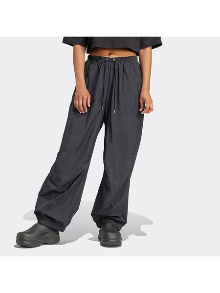 Adidas Spodnie dresowe w kolorze czarnym rozmiar: M. Czarne spodnie dresowe adidas, bez wzorów, z dresówki. Za 170.87 zł.