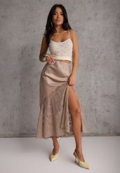 Beżowa Satynowa Spódnica Ozdobiona Rozcięciem na Nogę i Koronką Saviraet. Brązowe spódnice Renee, l, bez wzorów, z koronki, eleganckie, midi. Za 149.99 zł.