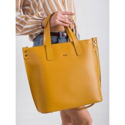 Torebka damska skórzana Rovicky TWR-77 żółta - Żółty. Żółte torebki klasyczne ROVICKY, bez wzorów, ze skóry, eleganckie, bez dodatków. Za 299.99 zł.