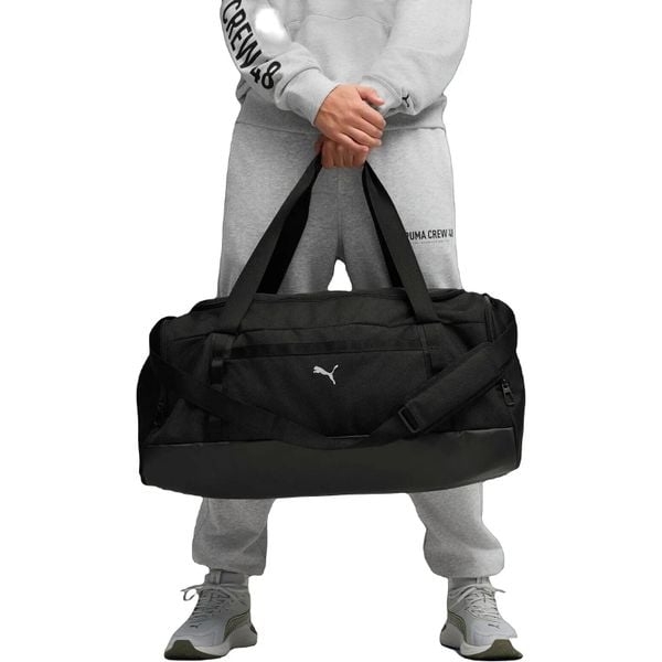 Torba Puma Train All Day Medium Sports Bag 58L. Czarne torby sportowe Puma, bez wzorów, z materiału. Za 390.00 zł.