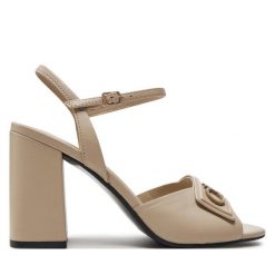 Sandały Calvin Klein. Sandały Calvin Klein, bez wzorów, bez obcasa, na słupku, bez zapięcia. Za 469.99 zł.